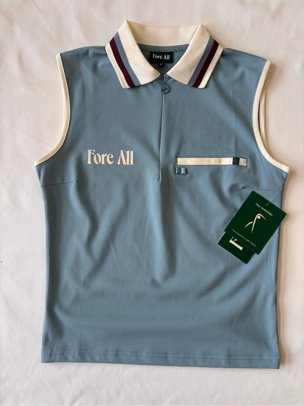 Women’s Sleeveless Polo Shirt in Dusty Blue